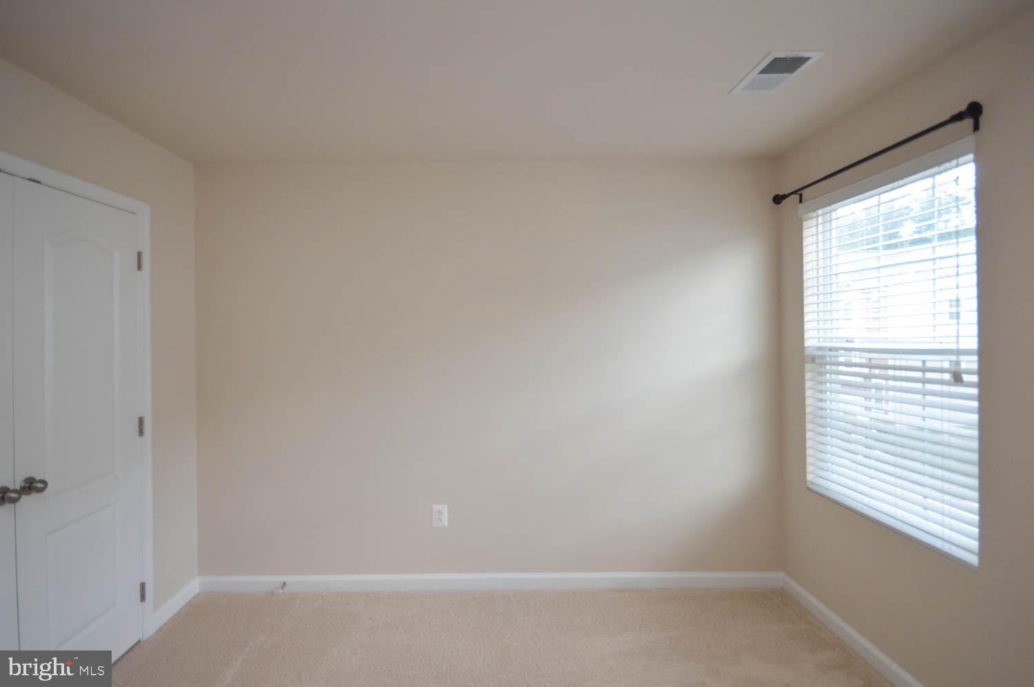 8426 Winding Trail Laurel, MD 20724 - Photo 16 of 41 a room that has a window in it