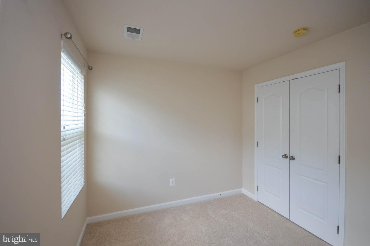 8426 Winding Trail Laurel, MD 20724 - Photo 23 of 41 a view of an empty room with a window