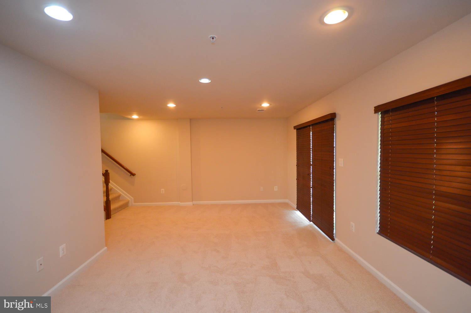 8426 Winding Trail Laurel, MD 20724 - Photo 30 of 41 a view of an empty room with stairs