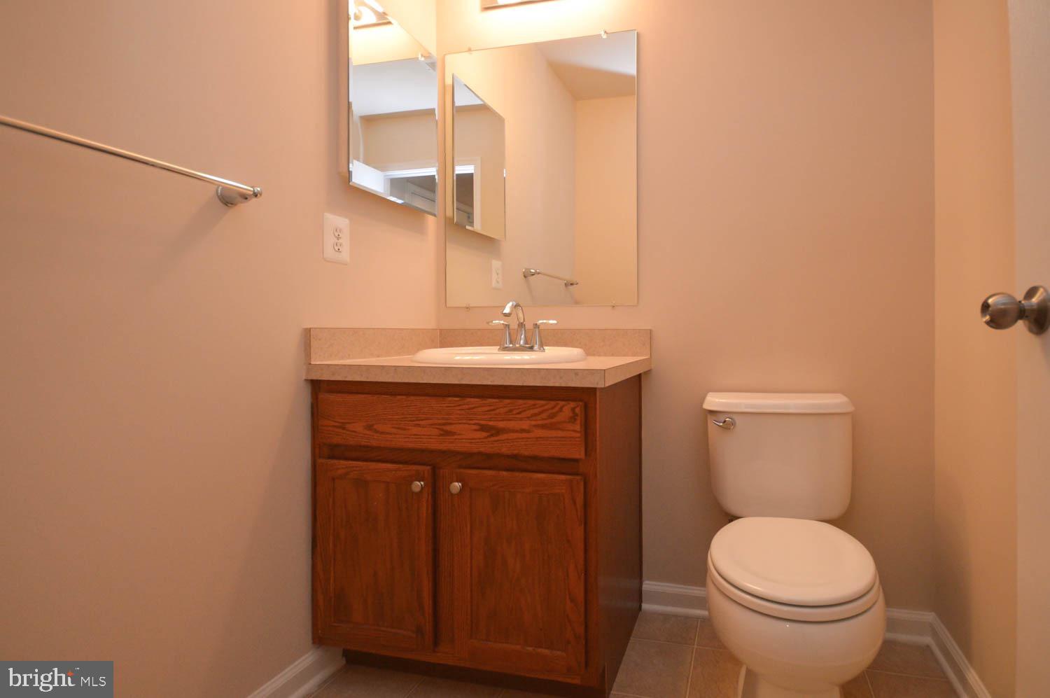 8426 Winding Trail Laurel, MD 20724 - Photo 31 of 41 a bathroom with a sink and a toilet