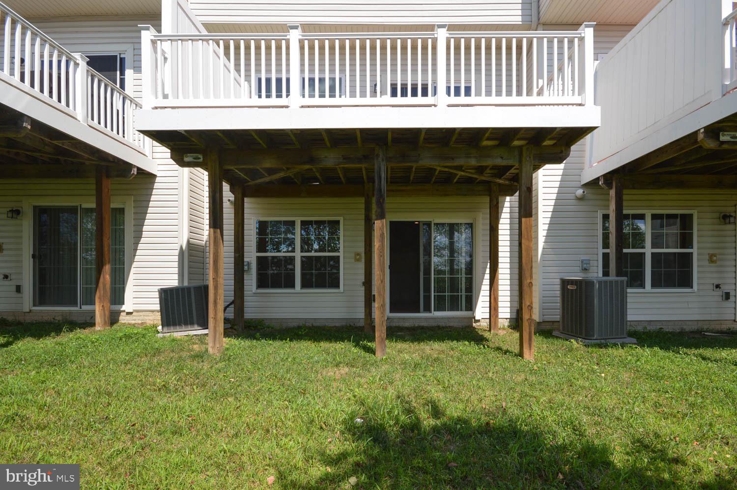 8426 Winding Trail Laurel, MD 20724 - Photo 32 of 41 a view of a house with a garden and deck