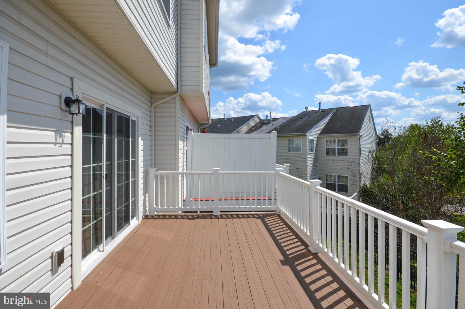 8426 Winding Trail Laurel, MD 20724 - Photo 34 of 41 a view of a houses with a balcony