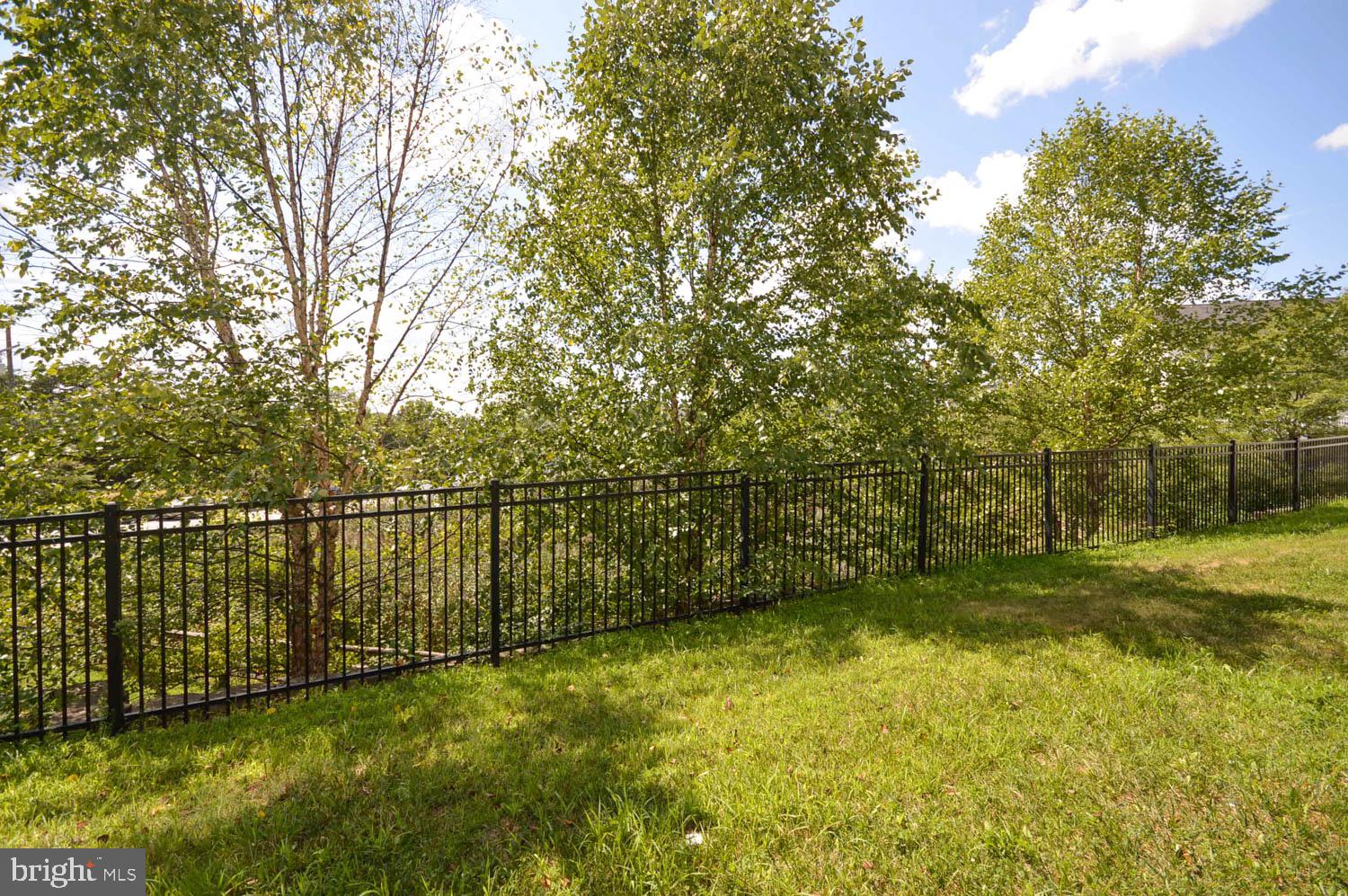 8426 Winding Trail Laurel, MD 20724 - Photo 41 of 41 a view of a yard with large trees