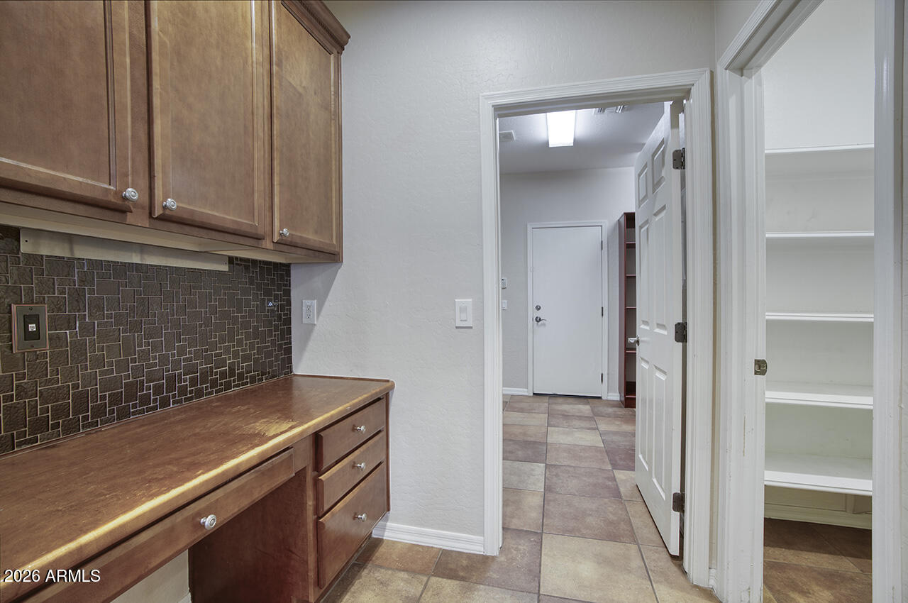 3985 East Hummingbird Lane Phoenix, AZ 85050 - Photo 12 of 47 a view of storage and utility room