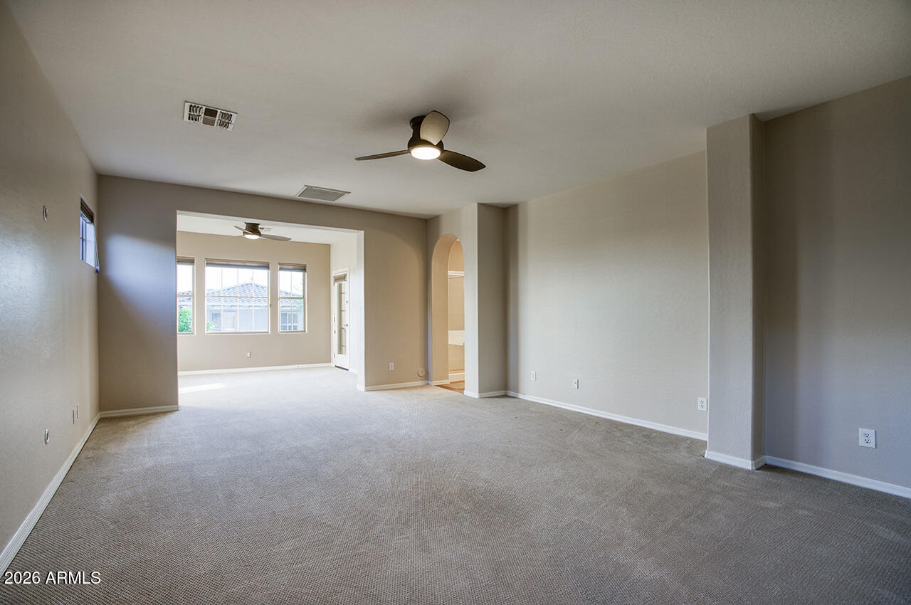 3985 East Hummingbird Lane Phoenix, AZ 85050 - Photo 16 of 47 a view of an empty room with a window