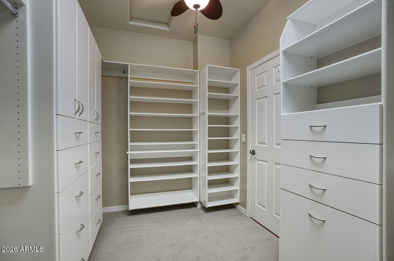 3985 East Hummingbird Lane Phoenix, AZ 85050 - Photo 19 of 47 a view of an empty walk in closet