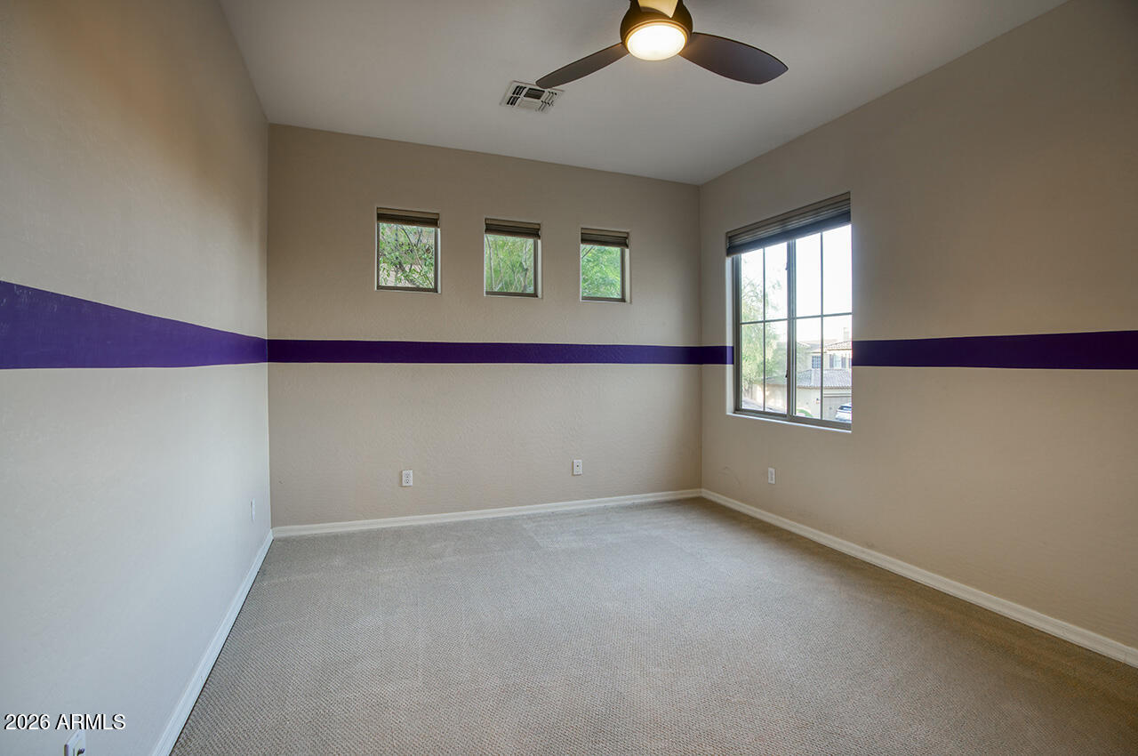 3985 East Hummingbird Lane Phoenix, AZ 85050 - Photo 22 of 47 a view of an empty room with a window