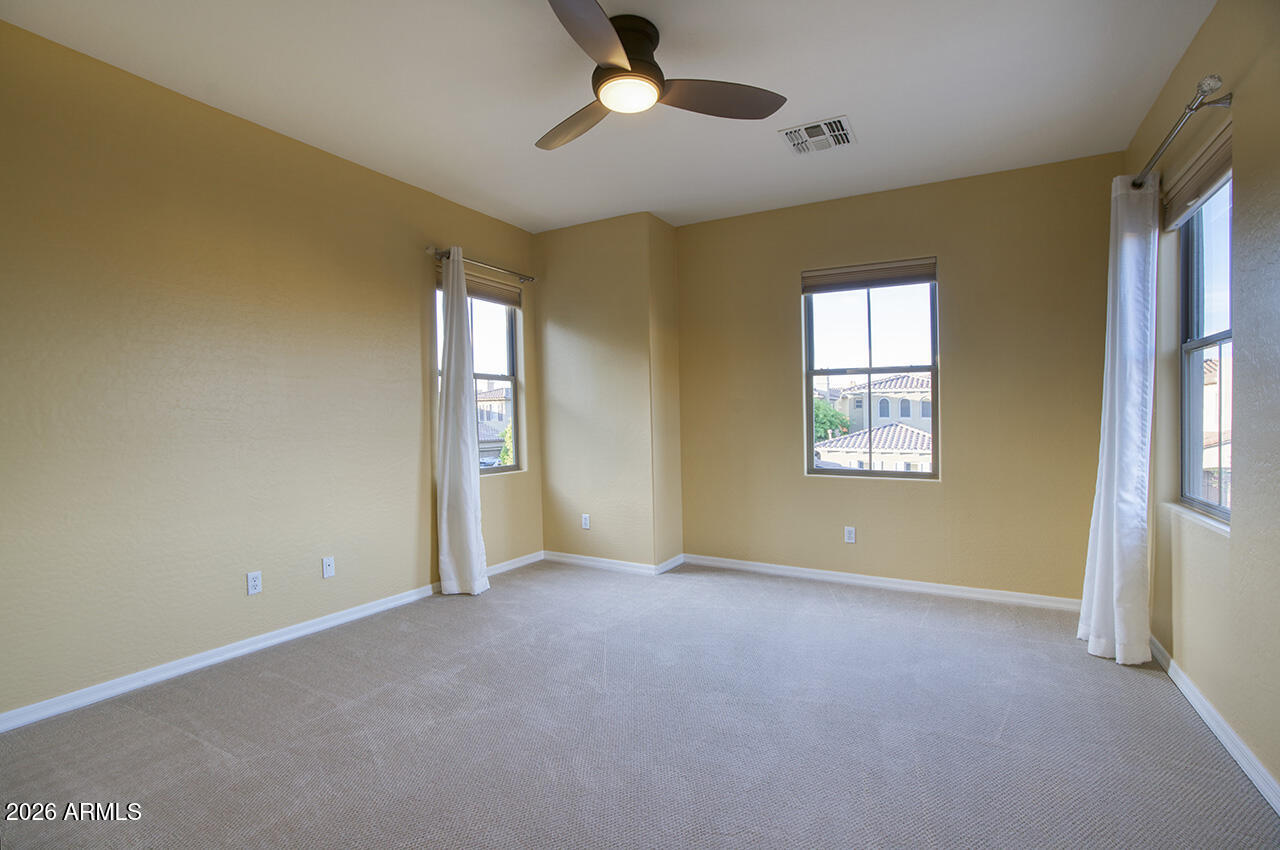 3985 East Hummingbird Lane Phoenix, AZ 85050 - Photo 24 of 47 a view of an empty room with a window