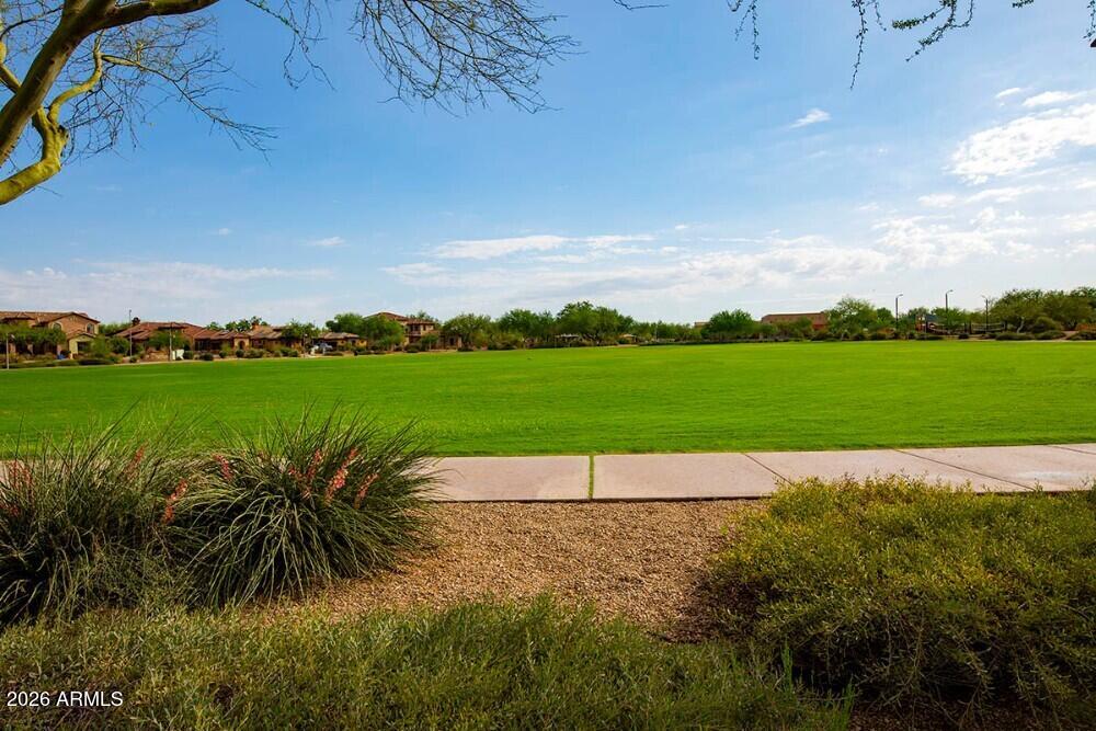 3985 East Hummingbird Lane Phoenix, AZ 85050 - Photo 36 of 47 a view of a lake with a big yard