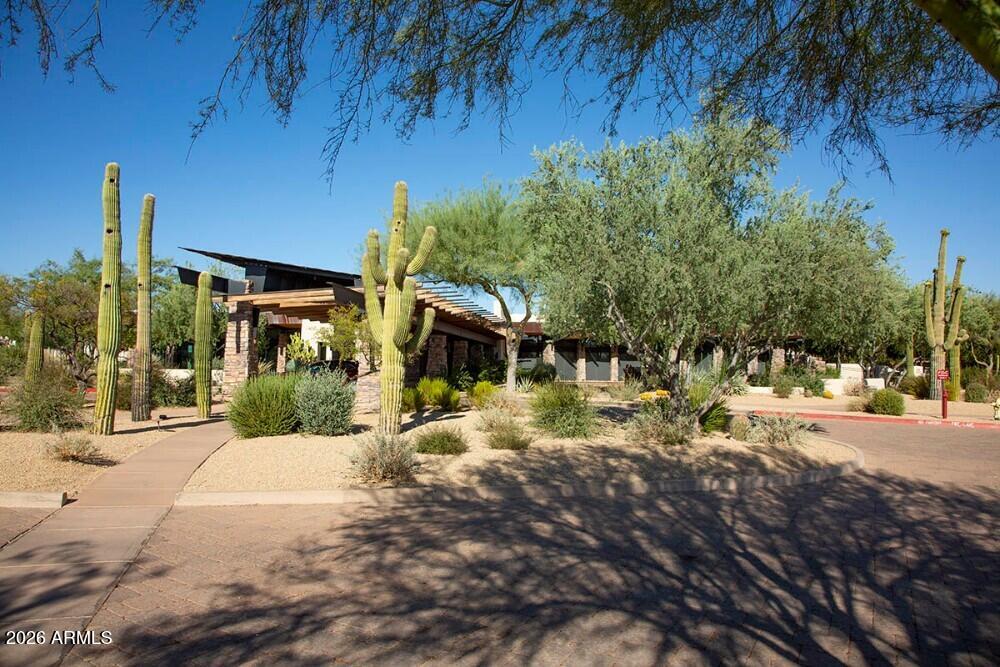 3985 East Hummingbird Lane Phoenix, AZ 85050 - Photo 43 of 47 a view of a house with a yard