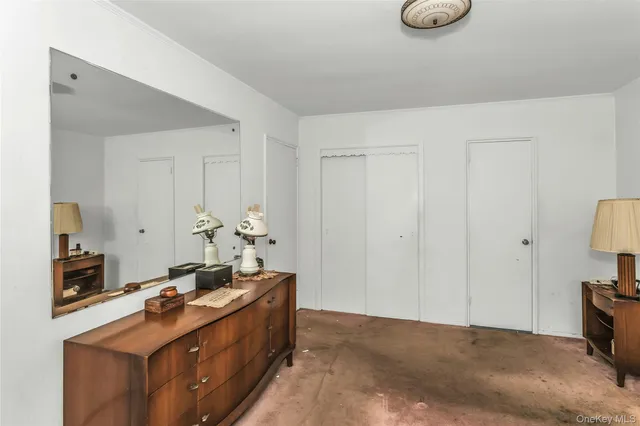 a bathroom with a toilet and a sink