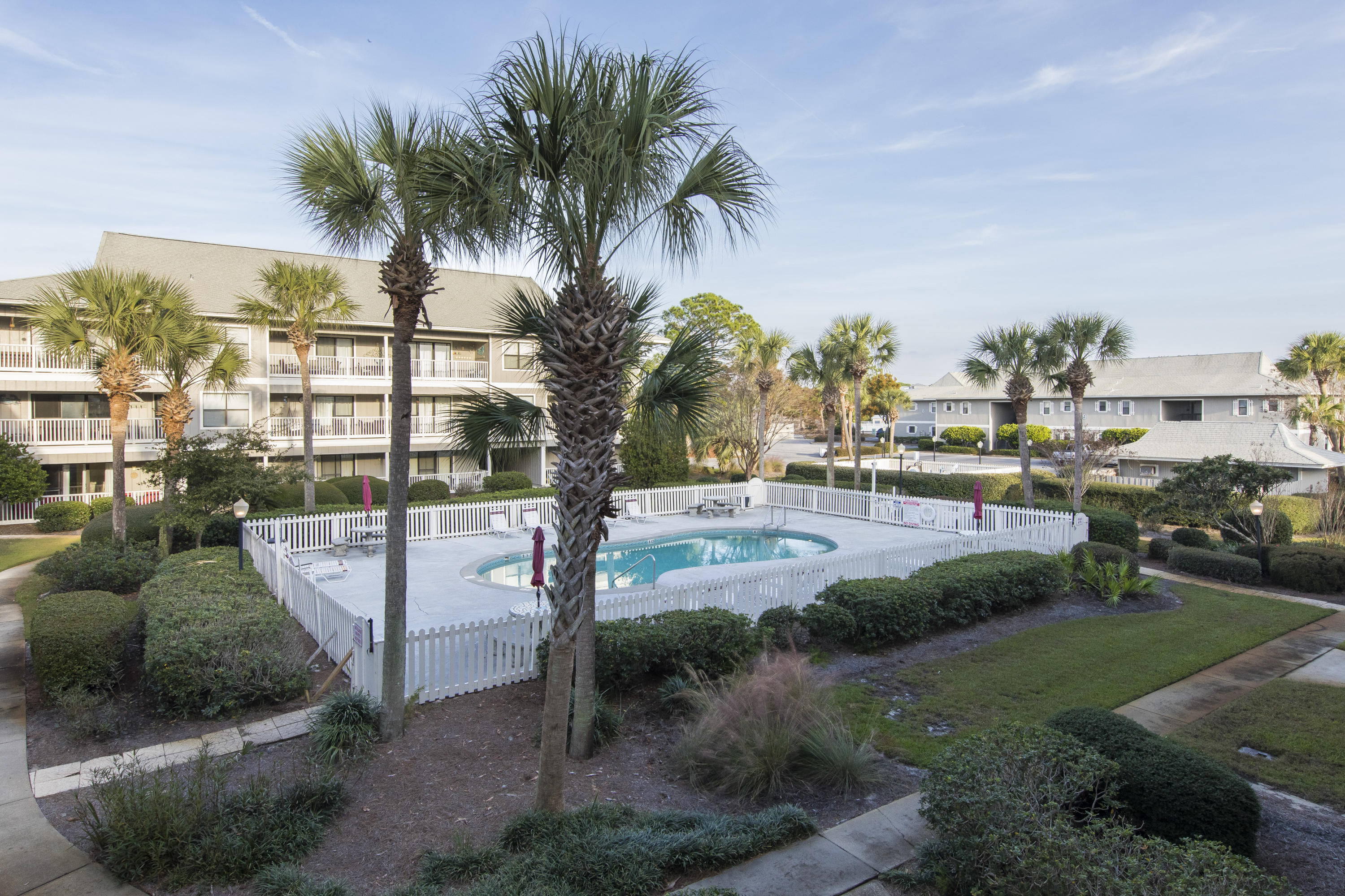 3799 Cty Highway, Unit H10 Santa Rosa Beach, FL 32459 - Photo 1 of 21 a view of a yard and palm trees