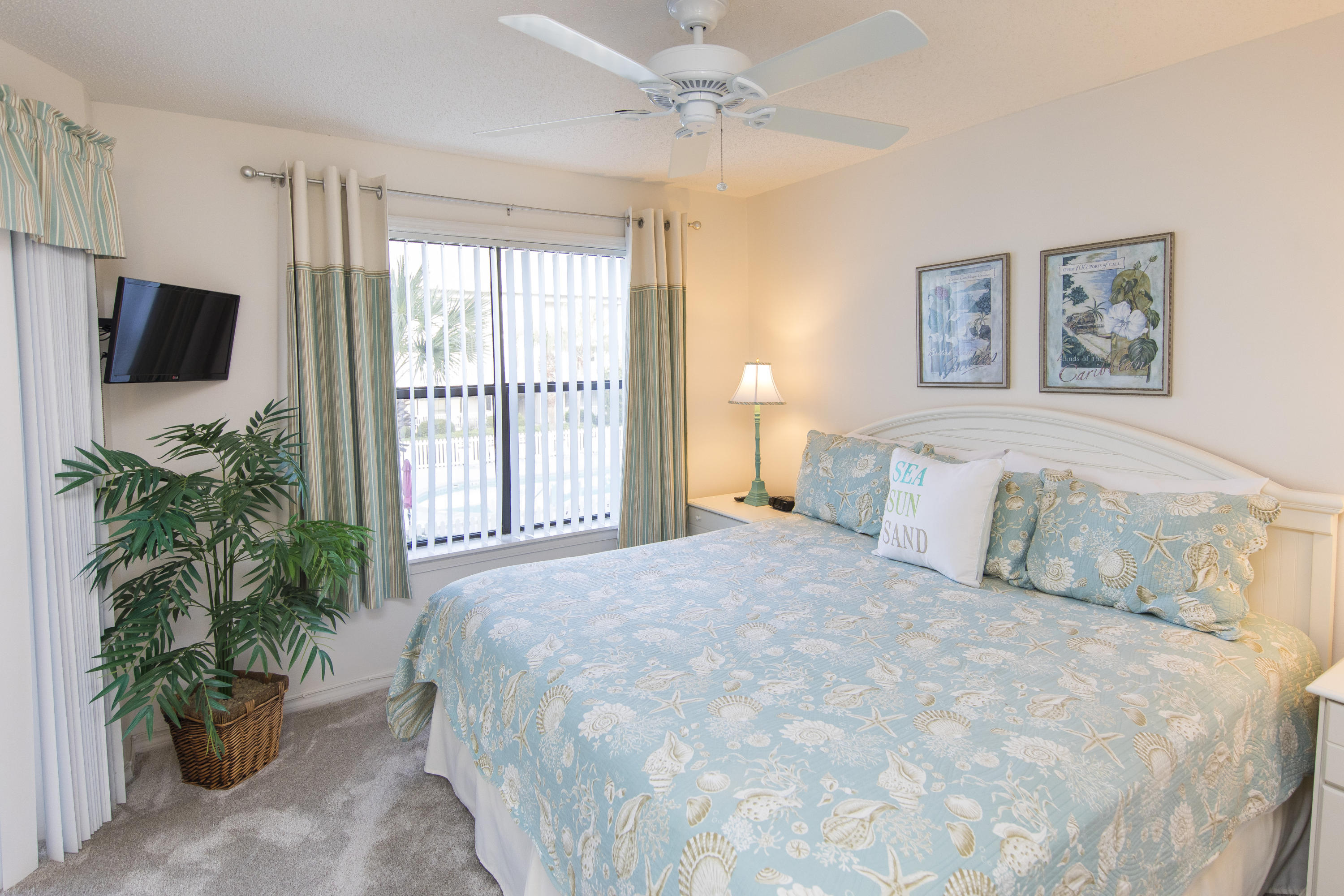 3799 Cty Highway, Unit H10 Santa Rosa Beach, FL 32459 - Photo 12 of 21 a bedroom with a large bed and a potted plant