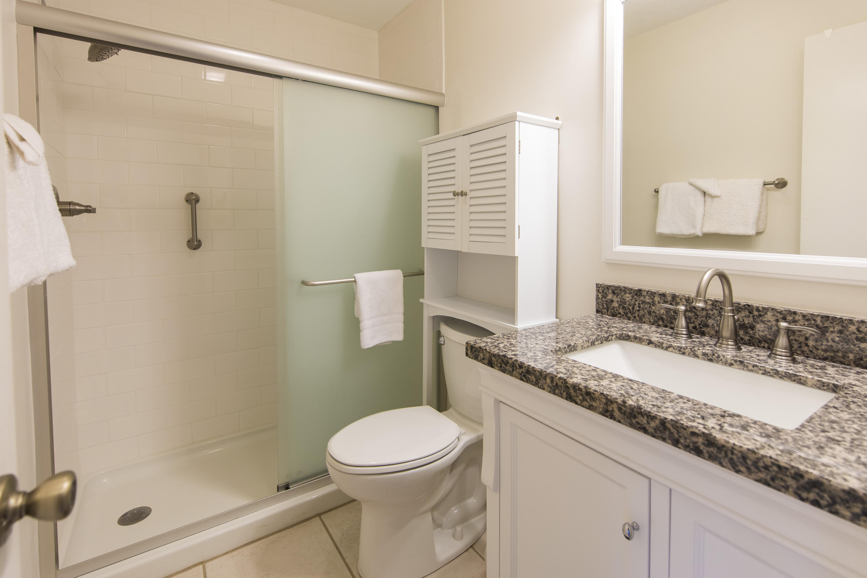 3799 Cty Highway, Unit H10 Santa Rosa Beach, FL 32459 - Photo 13 of 21 a bathroom with a granite countertop sink a mirror and a toilet