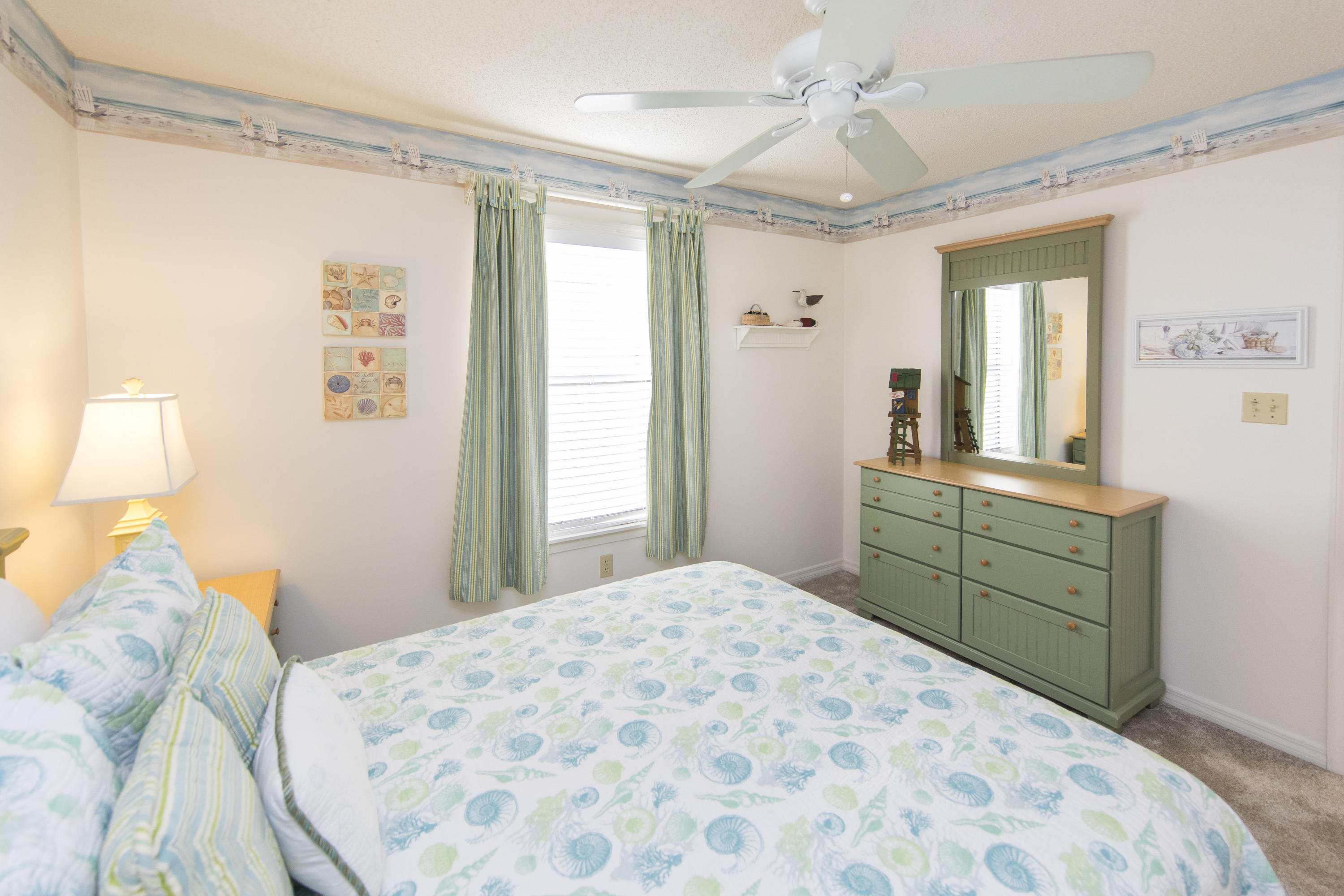 3799 Cty Highway, Unit H10 Santa Rosa Beach, FL 32459 - Photo 15 of 21 a bedroom with a bed and a dresser