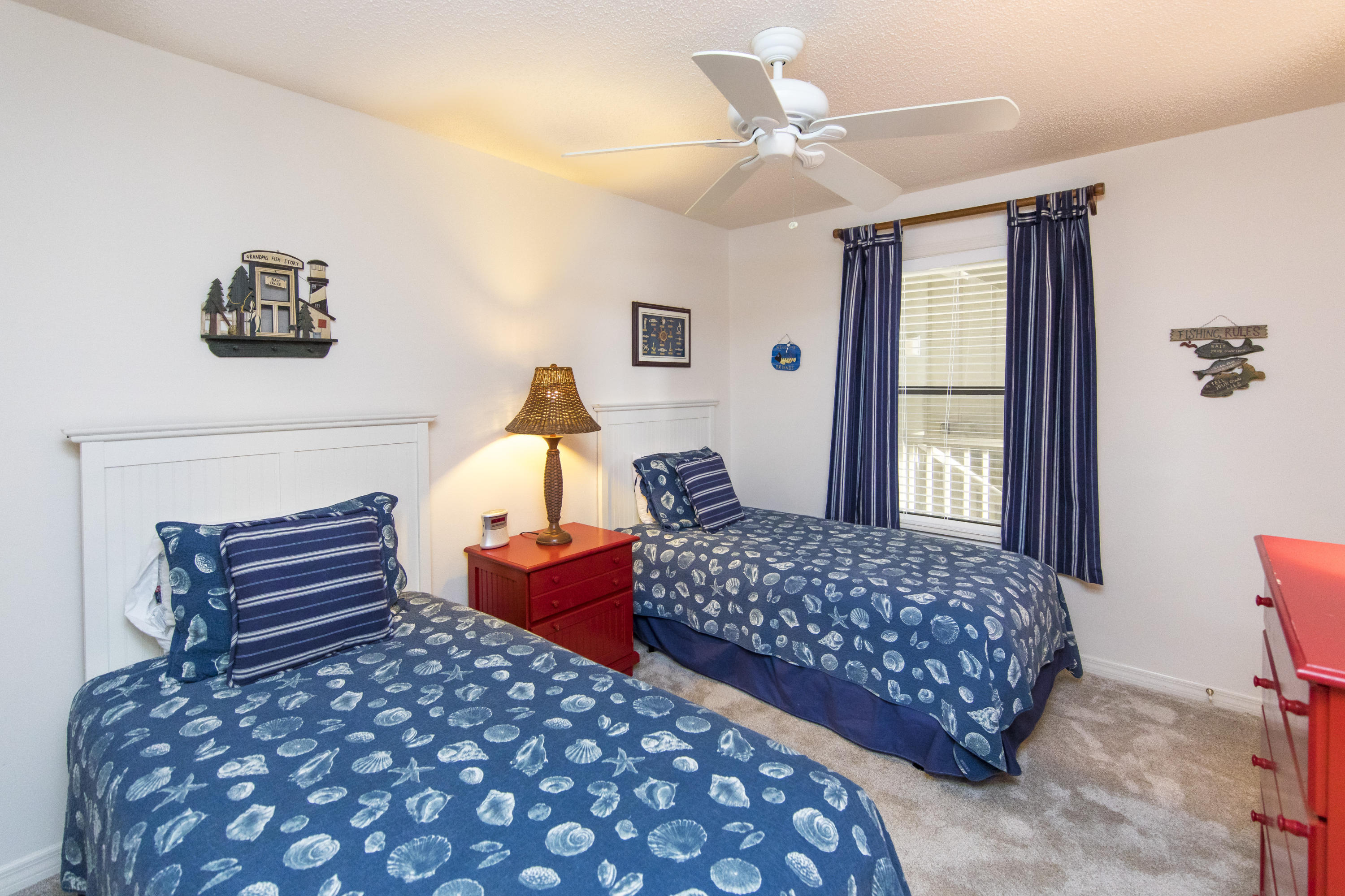 3799 Cty Highway, Unit H10 Santa Rosa Beach, FL 32459 - Photo 17 of 21 a bedroom with double bed and a window
