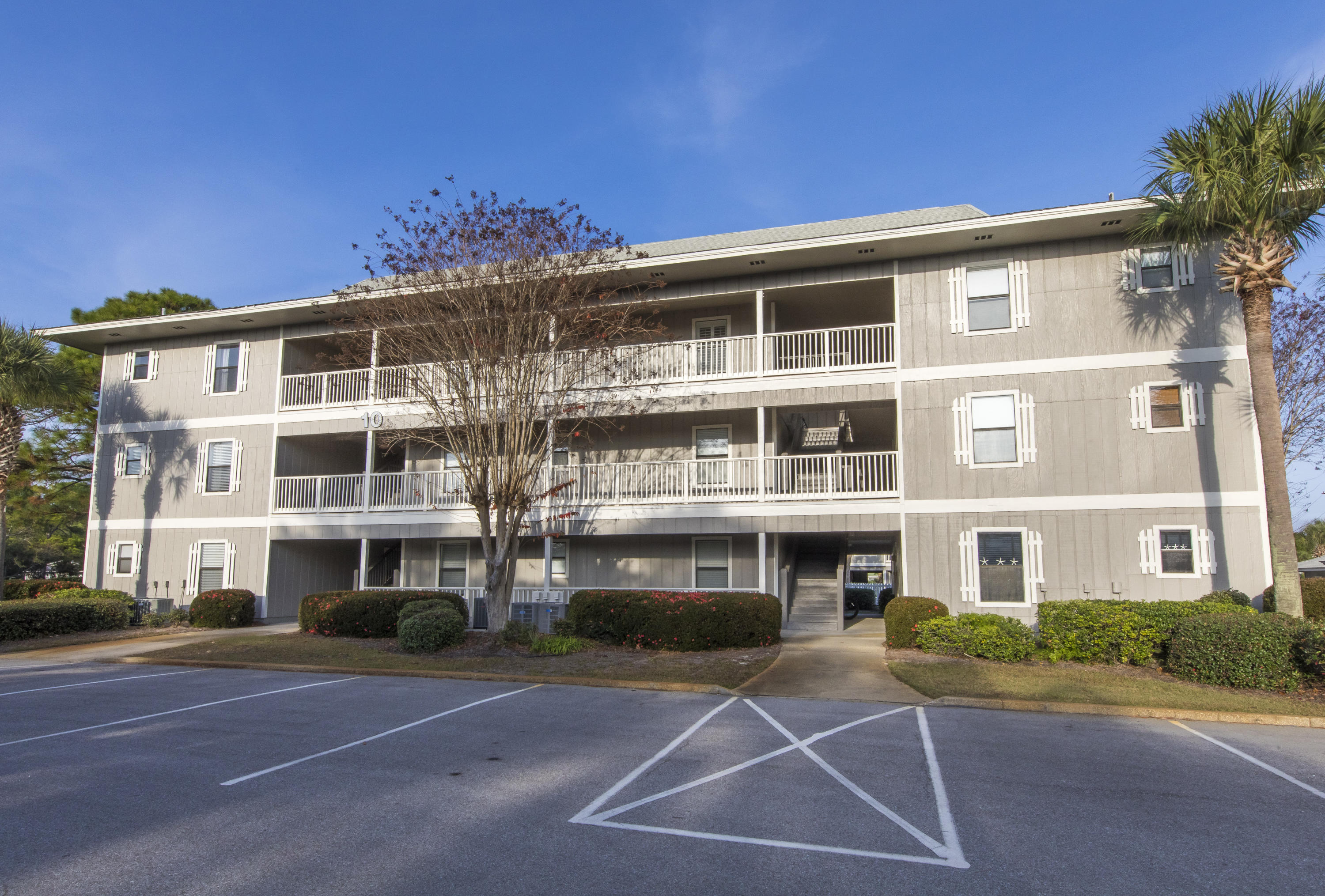 3799 Cty Highway, Unit H10 Santa Rosa Beach, FL 32459 - Photo 21 of 21 a front view of a building with a road