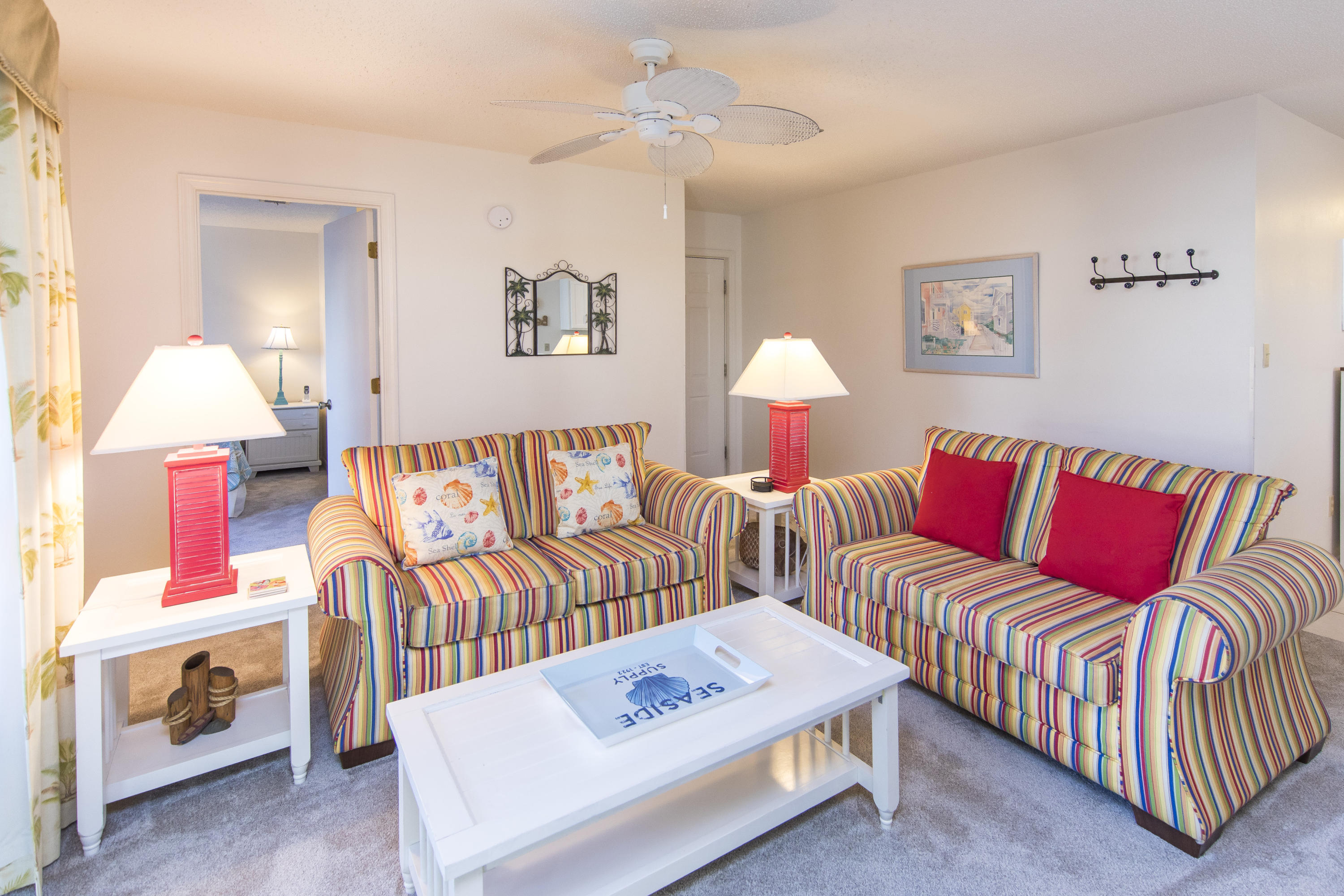 3799 Cty Highway, Unit H10 Santa Rosa Beach, FL 32459 - Photo 5 of 21 a living room with furniture and a lamp