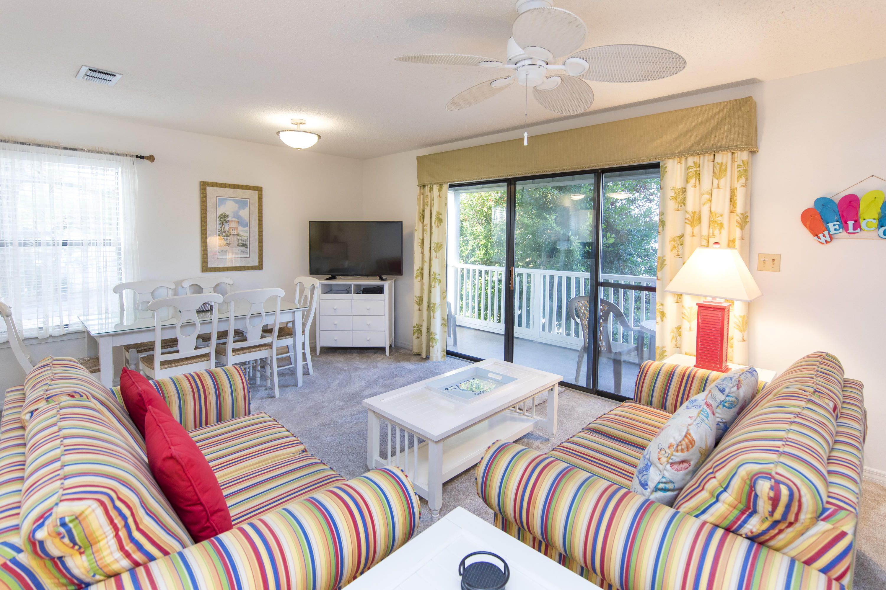 3799 Cty Highway, Unit H10 Santa Rosa Beach, FL 32459 - Photo 6 of 21 a bedroom with two beds and a flat screen tv