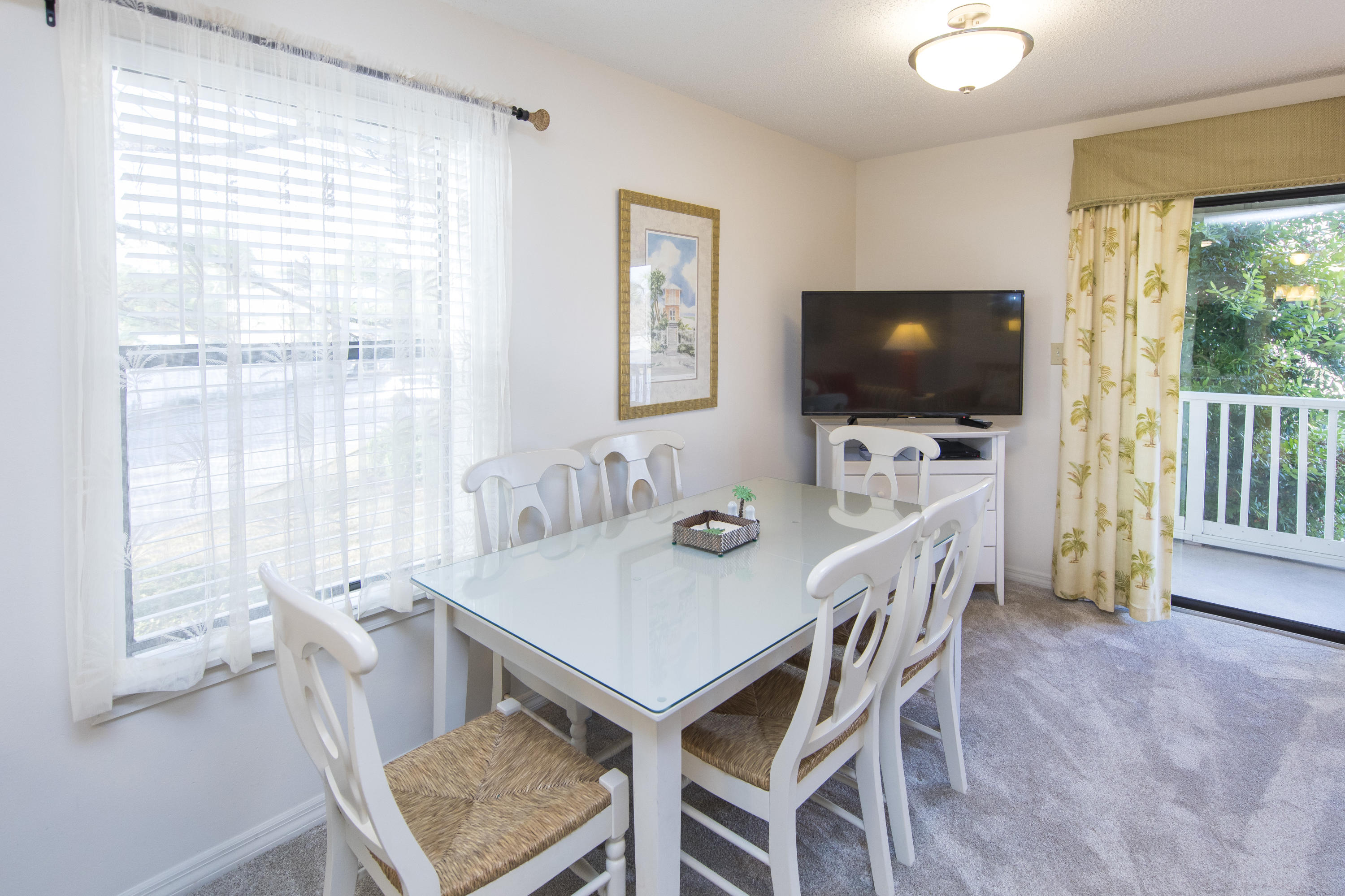3799 Cty Highway, Unit H10 Santa Rosa Beach, FL 32459 - Photo 8 of 21 a view of a dining room with furniture and wooden floor