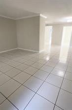 3614 Taylor Street Hollywood, FL 33021 - Photo 3 of 20 a view of a room with white tiles