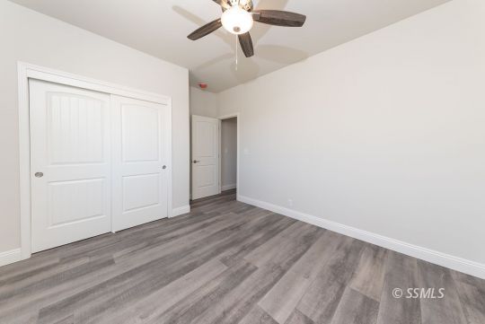 327 Abigail Street Ridgecrest, CA 93555 - Photo 16 of 35 wooden floor in an empty room