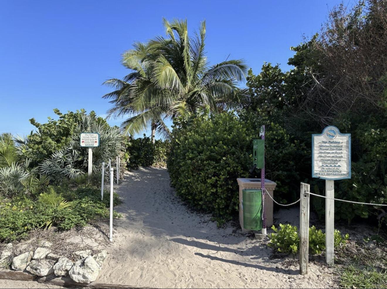 49 Douglas Drive Ocean Ridge, FL 33435 - Photo 58 of 65 a view of a street with potted plants