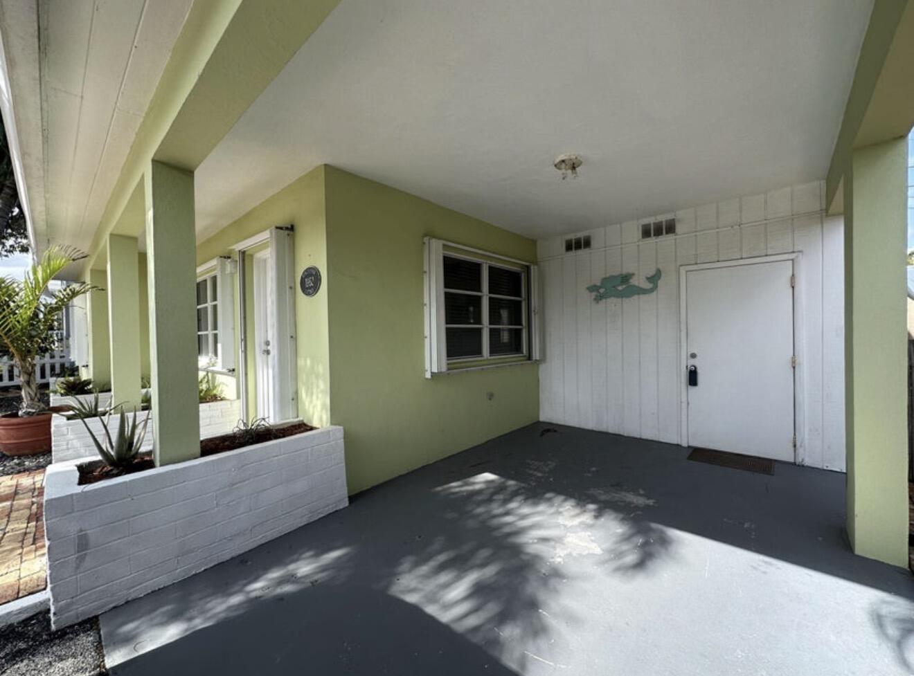 49 Douglas Drive Ocean Ridge, FL 33435 - Photo 9 of 65 a view of a livingroom with an empty space and a balcony