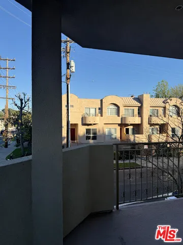 wooden floor and window in an empty room