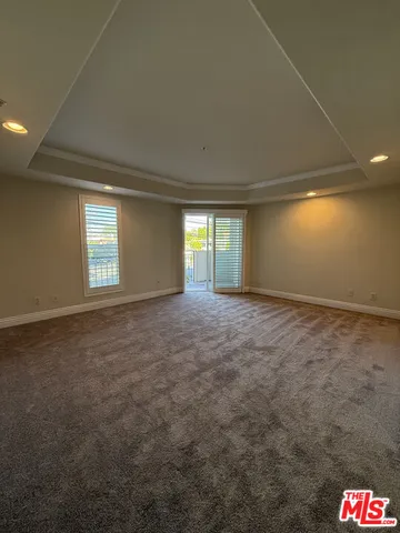 a view of a street from a balcony