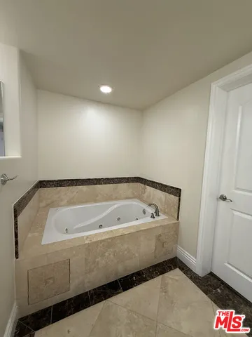 a bathroom with a bathtub