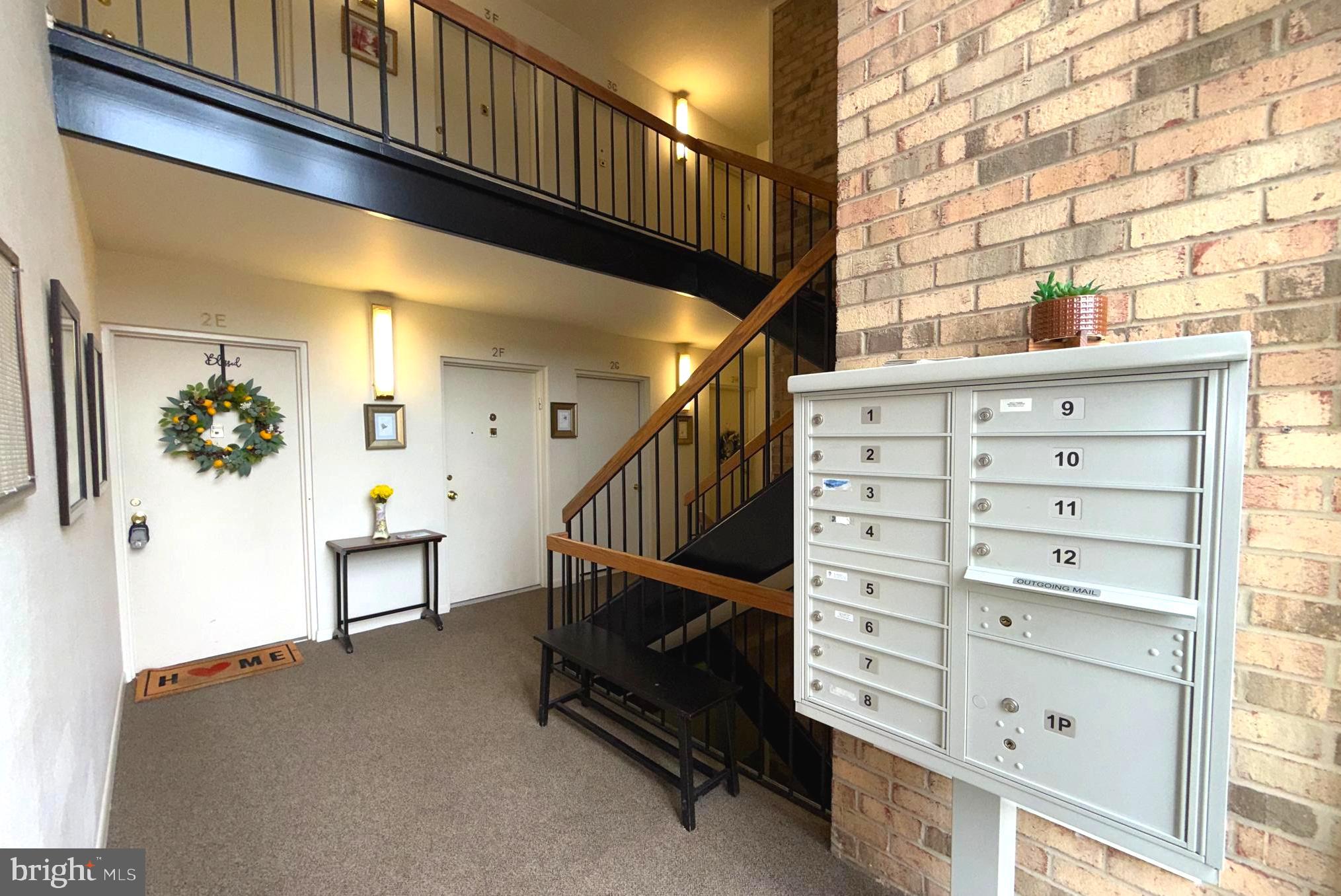 3352 Chiswick Court, Unit 572E Silver Spring, MD 20906 - Photo 28 of 41 a view of a hallway with stairs