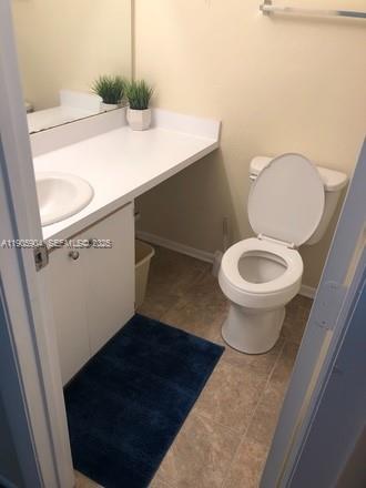 4000 Southwest 23rd Street, Unit 2301 Gainesville, FL 32608 - Photo 15 of 19 a bathroom with a sink and a toilet