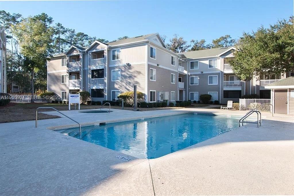 4000 Southwest 23rd Street, Unit 2301 Gainesville, FL 32608 - Photo 18 of 19 a view of a building with a swimming pool
