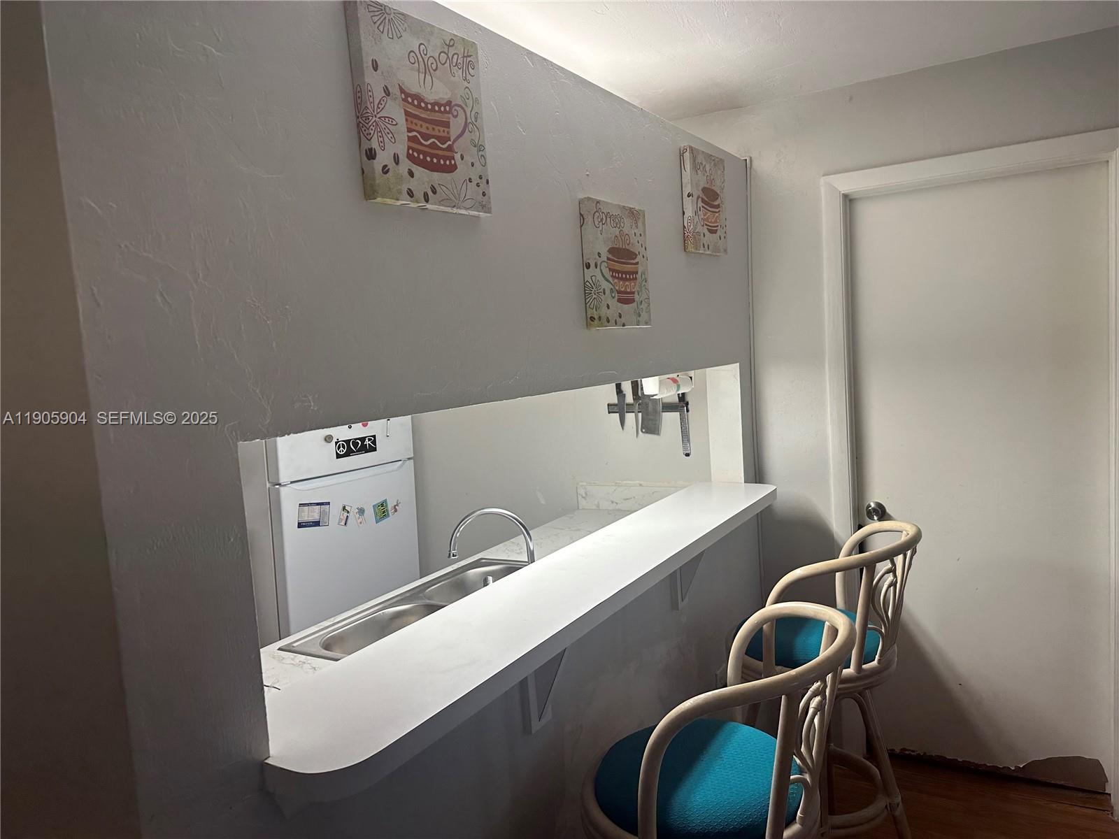 4000 Southwest 23rd Street, Unit 2301 Gainesville, FL 32608 - Photo 7 of 19 a room with storage and utility