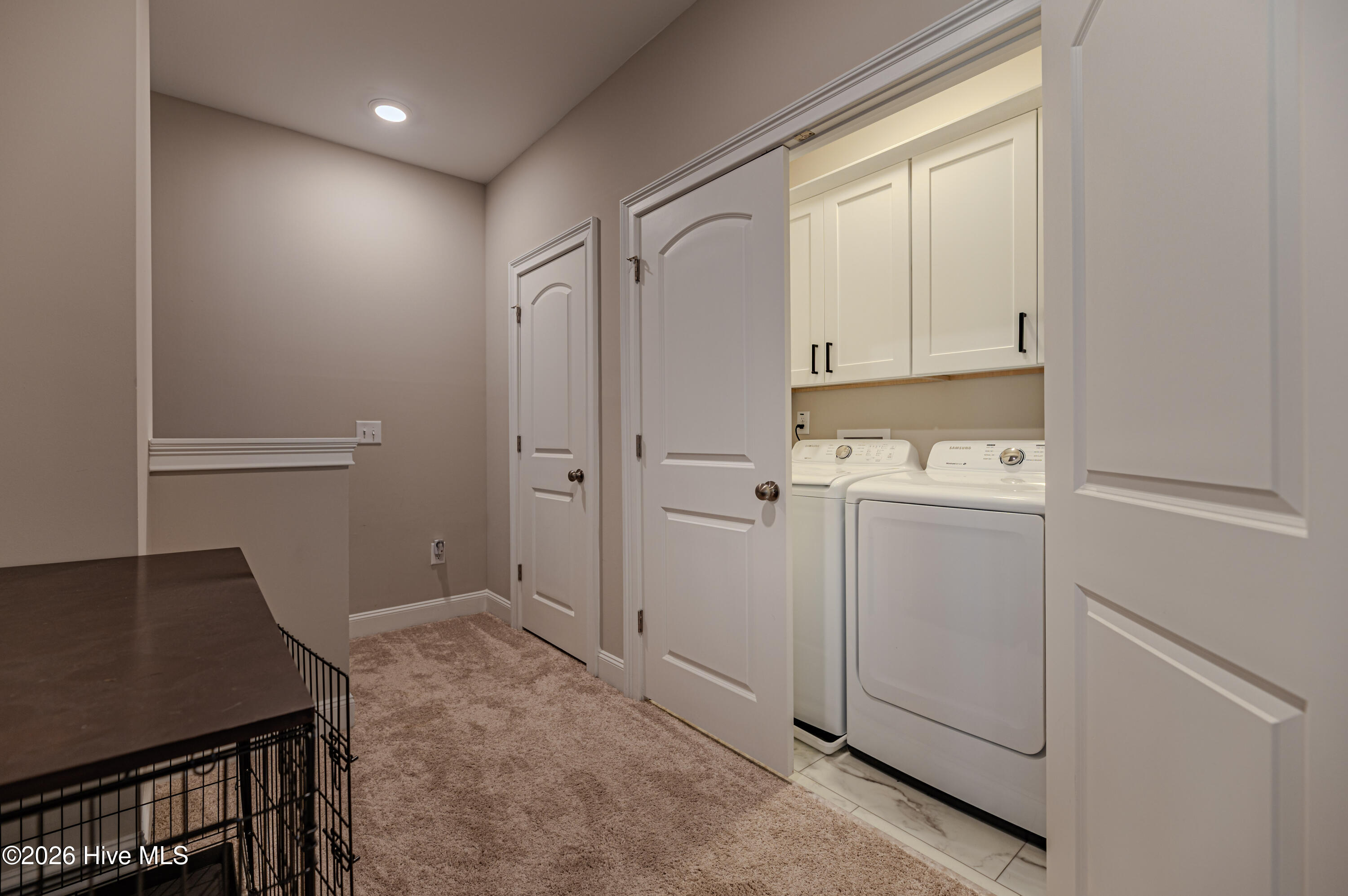 760 Daphne Lane Vass, NC 28394 - Photo 14 of 29 Upstairs Laundry Closet