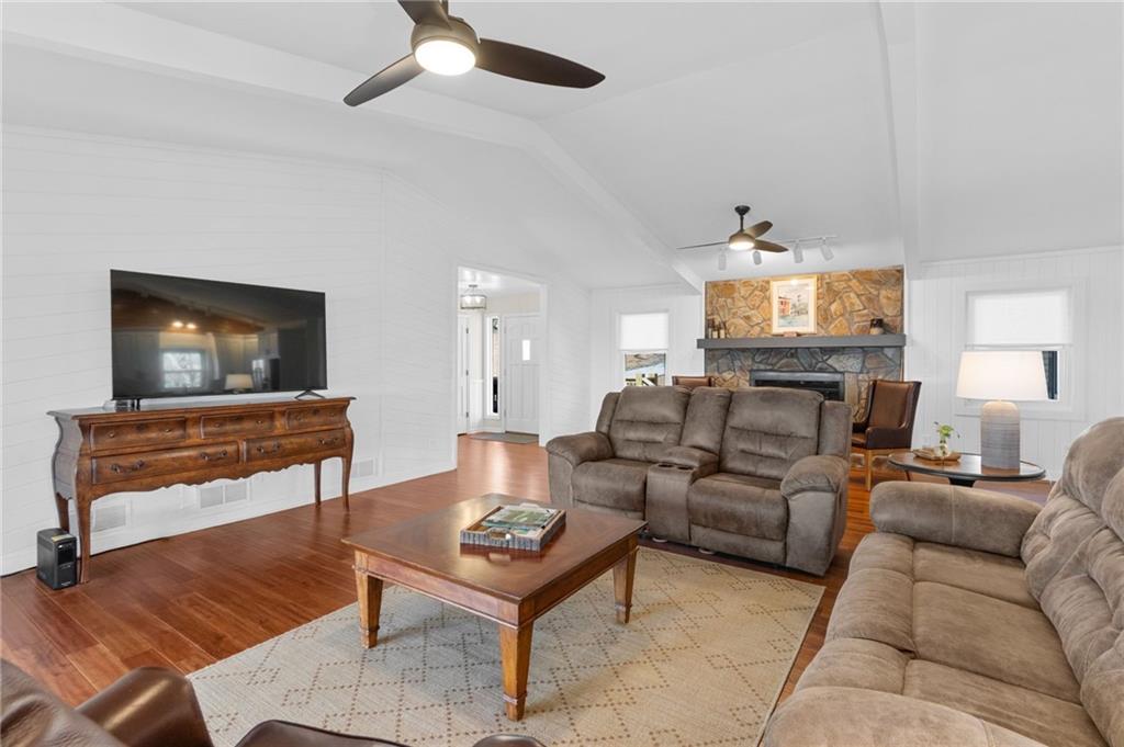 295 Starcross Lane Jasper, GA 30143 - Photo 10 of 65 a living room with furniture and a flat screen tv