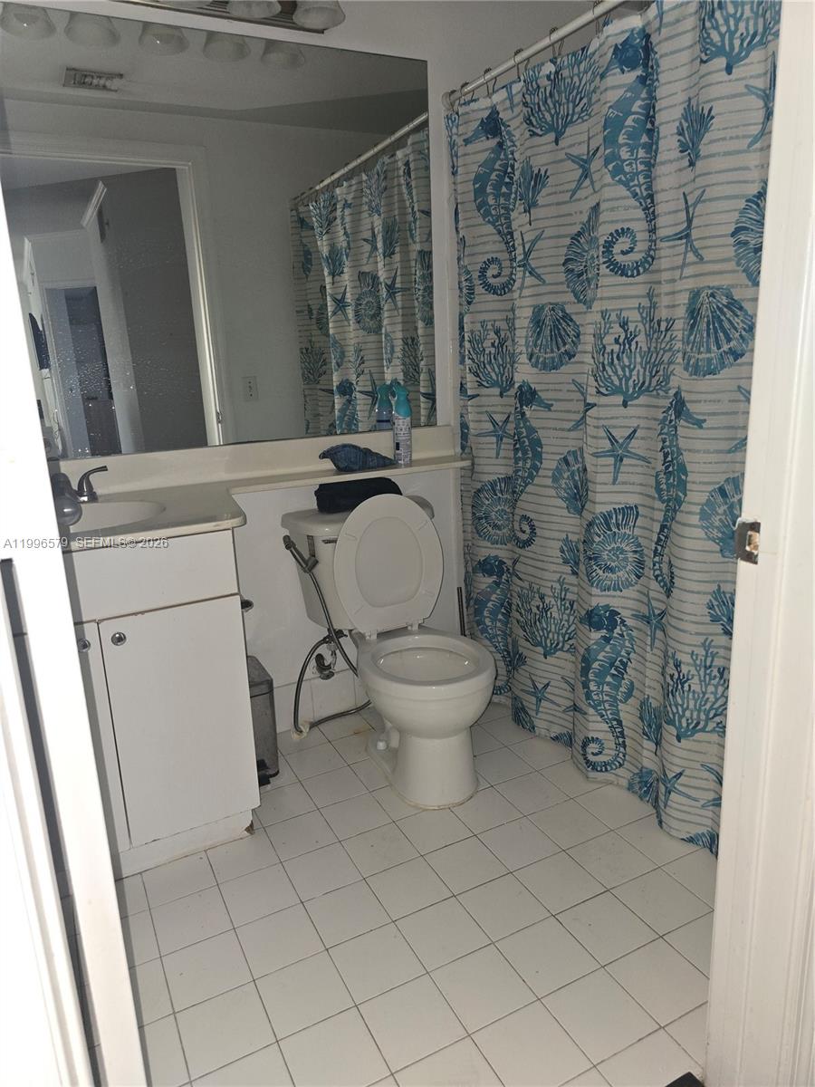 17150 North Bay Road, Unit 2316 Sunny Isles Beach, FL 33160 - Photo 8 of 9 a bathroom with a toilet and a sink