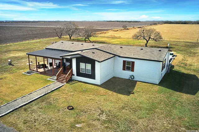 a view of a balcony with an ocean