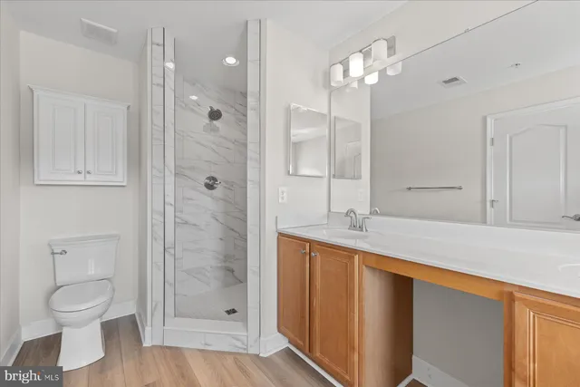 a picture of a bench in front of a window