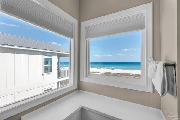 a view of a bathroom with a glass door
