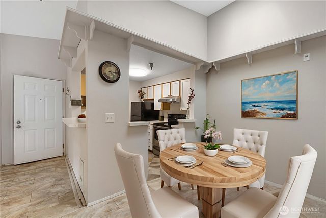 a view of a dining room with furniture