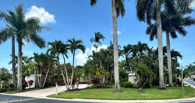 1404 Pearl Lake Point Naples, FL 34114 - Photo 2 of 9 a view of a park with palm trees