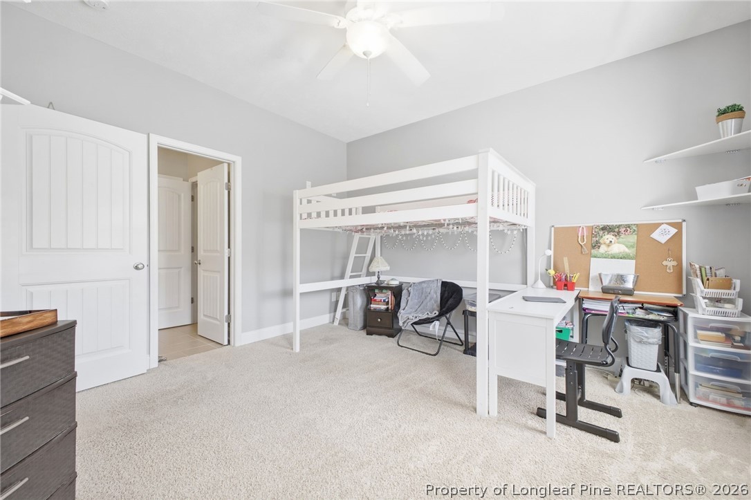 2589 June Johnson Road Raeford, NC 28376 - Photo 31 of 49 a bedroom with furniture and a window