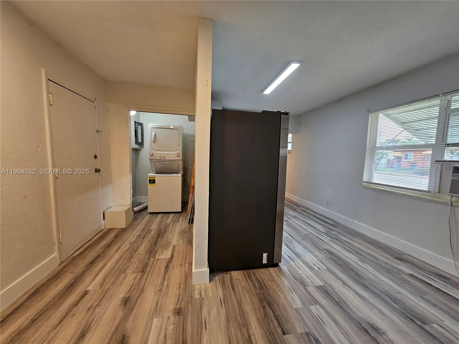 1727 Fletcher Street, Unit 1 Hollywood, FL 33020 - Photo 7 of 31 a view of a hallway with wooden floor