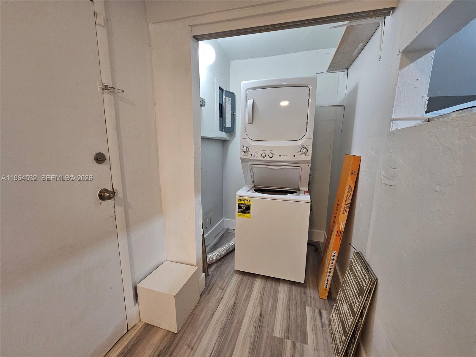 1727 Fletcher Street, Unit 1 Hollywood, FL 33020 - Photo 8 of 31 a view of a hallway with washer and dryer