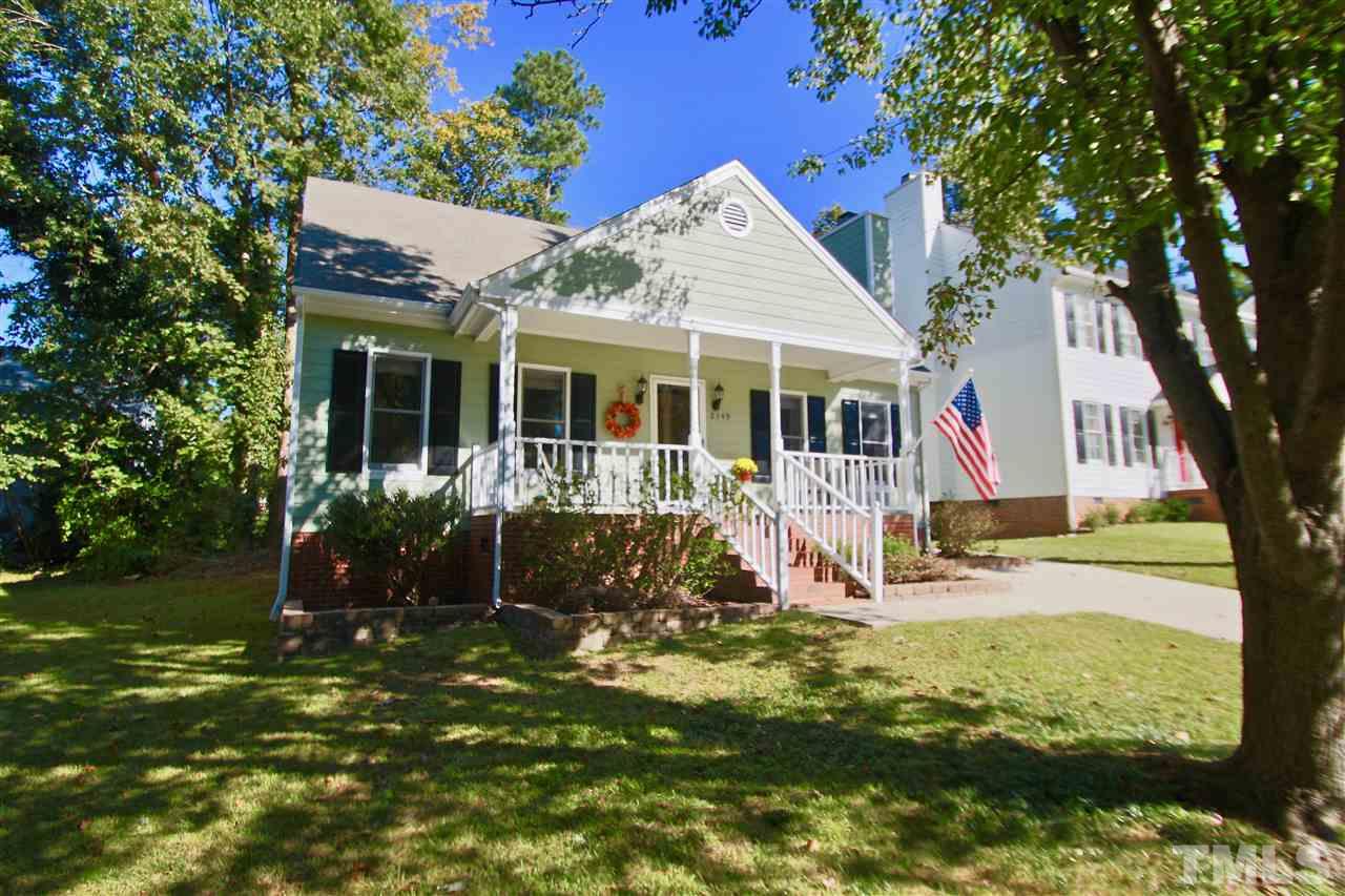 2349 Declaration Drive Raleigh, NC 27615 - Photo 3 of 25 a view of a house with garden and trees