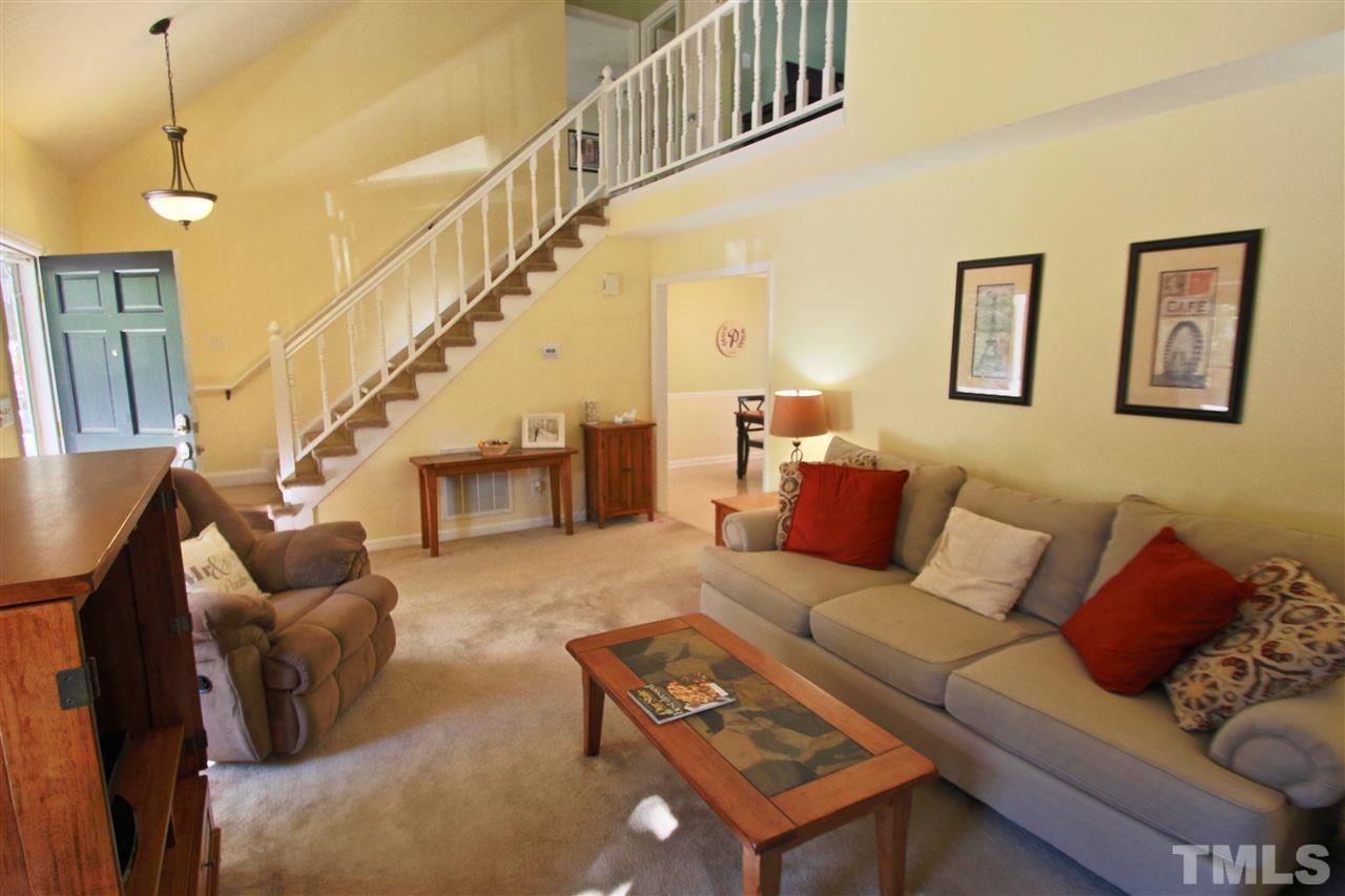 2349 Declaration Drive Raleigh, NC 27615 - Photo 8 of 25 a living room with furniture and a ceiling fan