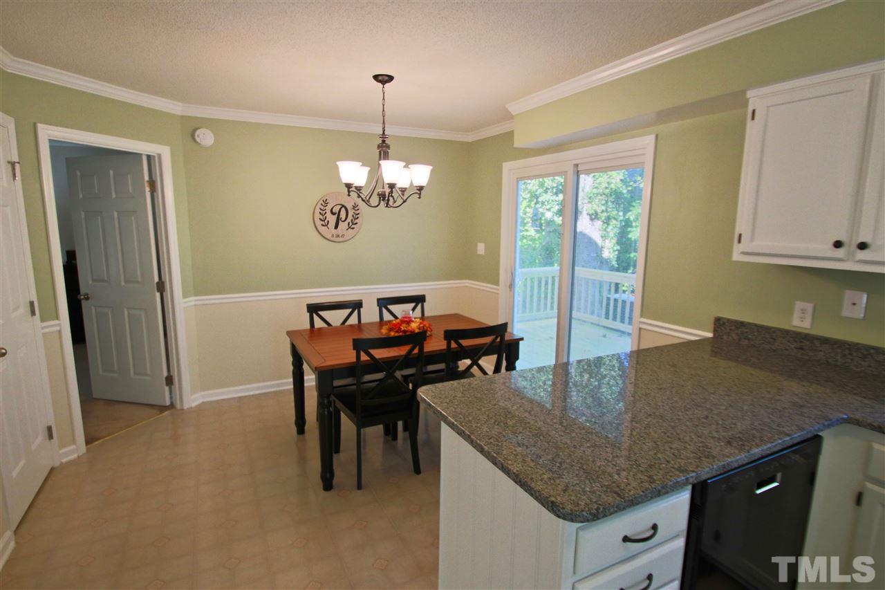 2349 Declaration Drive Raleigh, NC 27615 - Photo 10 of 25 a view of dining table and chairs