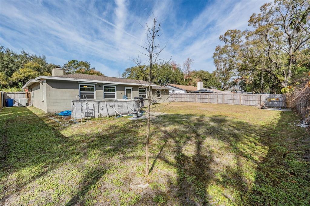 18631 San Rio Circle Lutz, FL 33549 - Photo 22 of 39 a view of a house with pool and sitting area